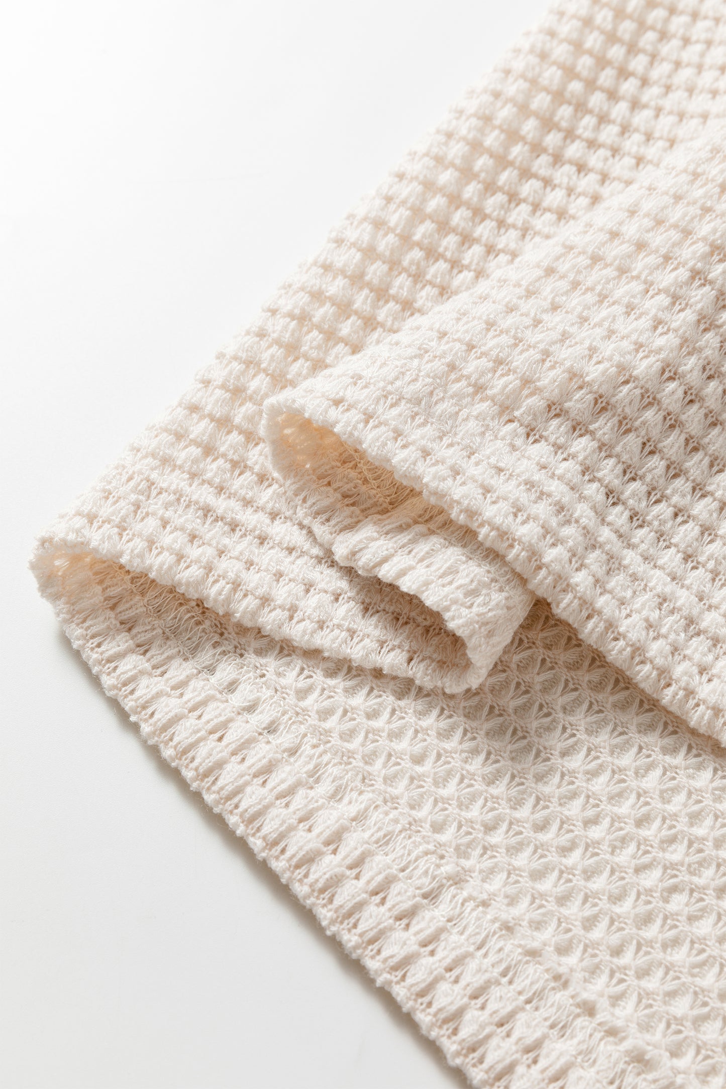 Jet Stream Solid Color Textured Knit Asymmetric Shoulder Long Sleeve Top