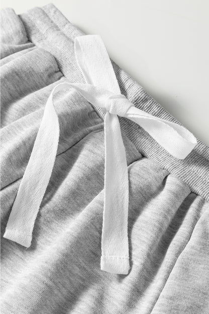 Light Grey Lace Patchwork Drop Shoulder Pullover Drawstring Skort 2pcs Outfit