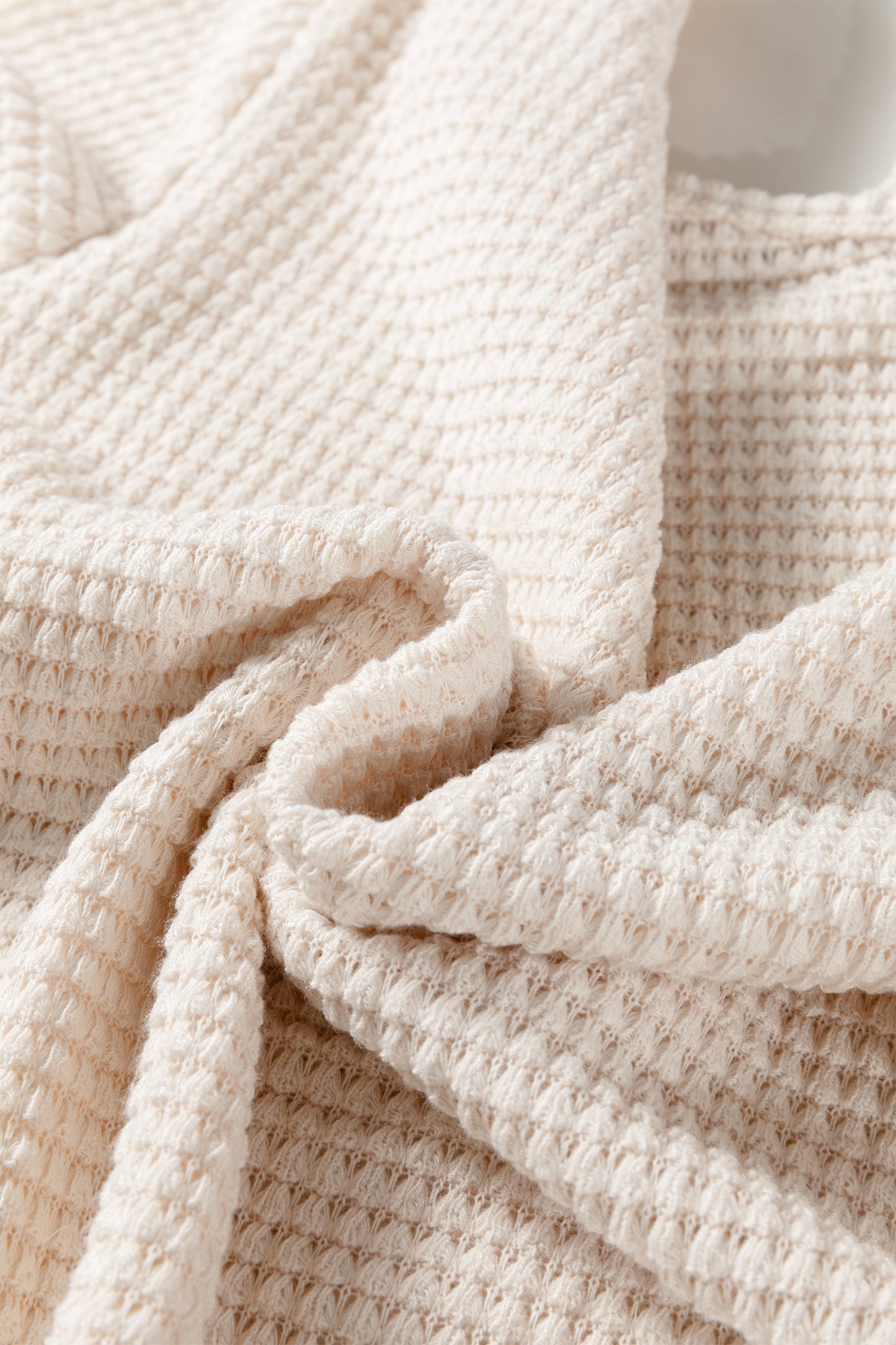 Jet Stream Solid Color Textured Knit Asymmetric Shoulder Long Sleeve Top